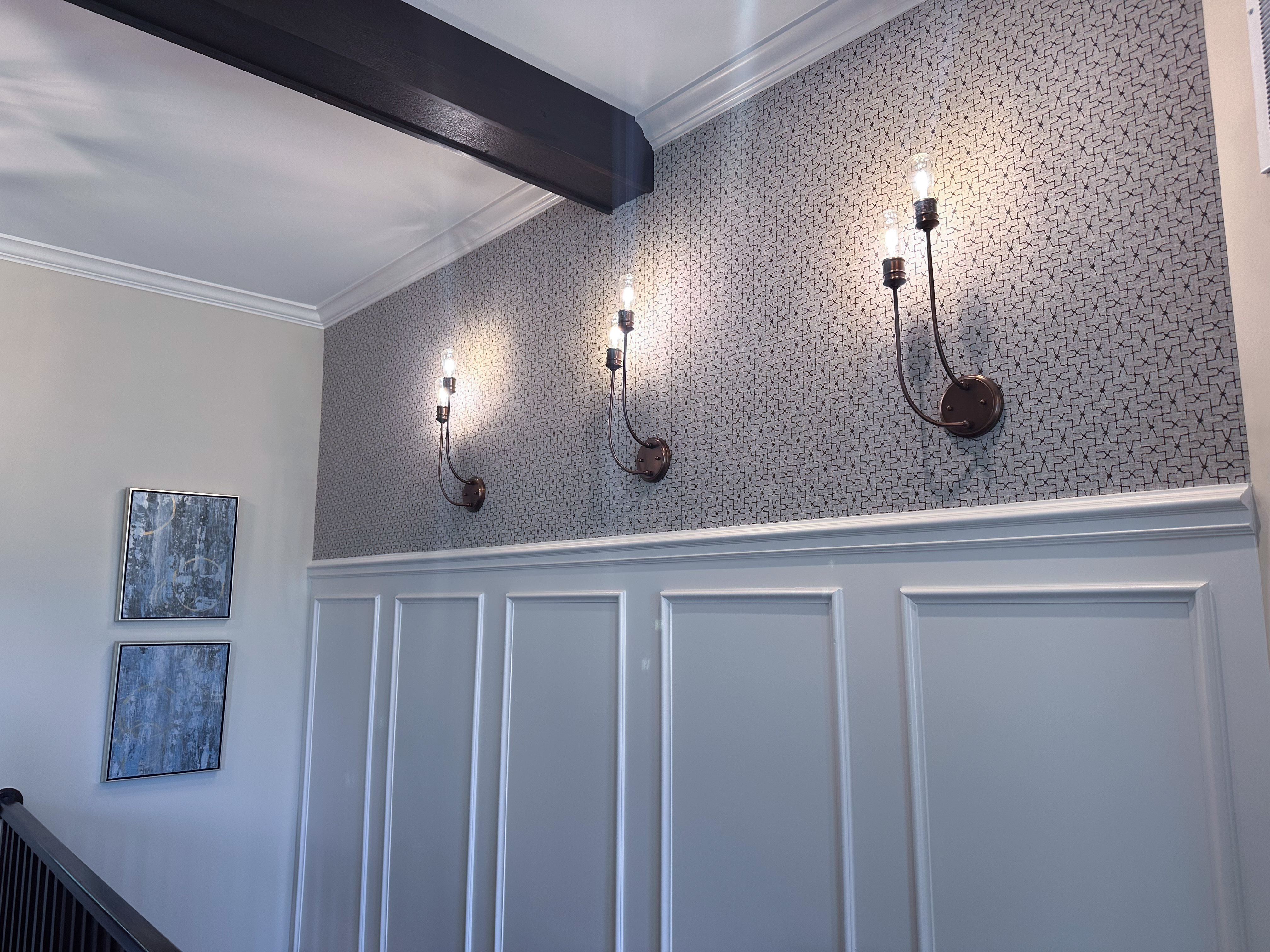 Homearama 2024 Lighting with 3 pendant lights, wallpaper, and textured walls.
