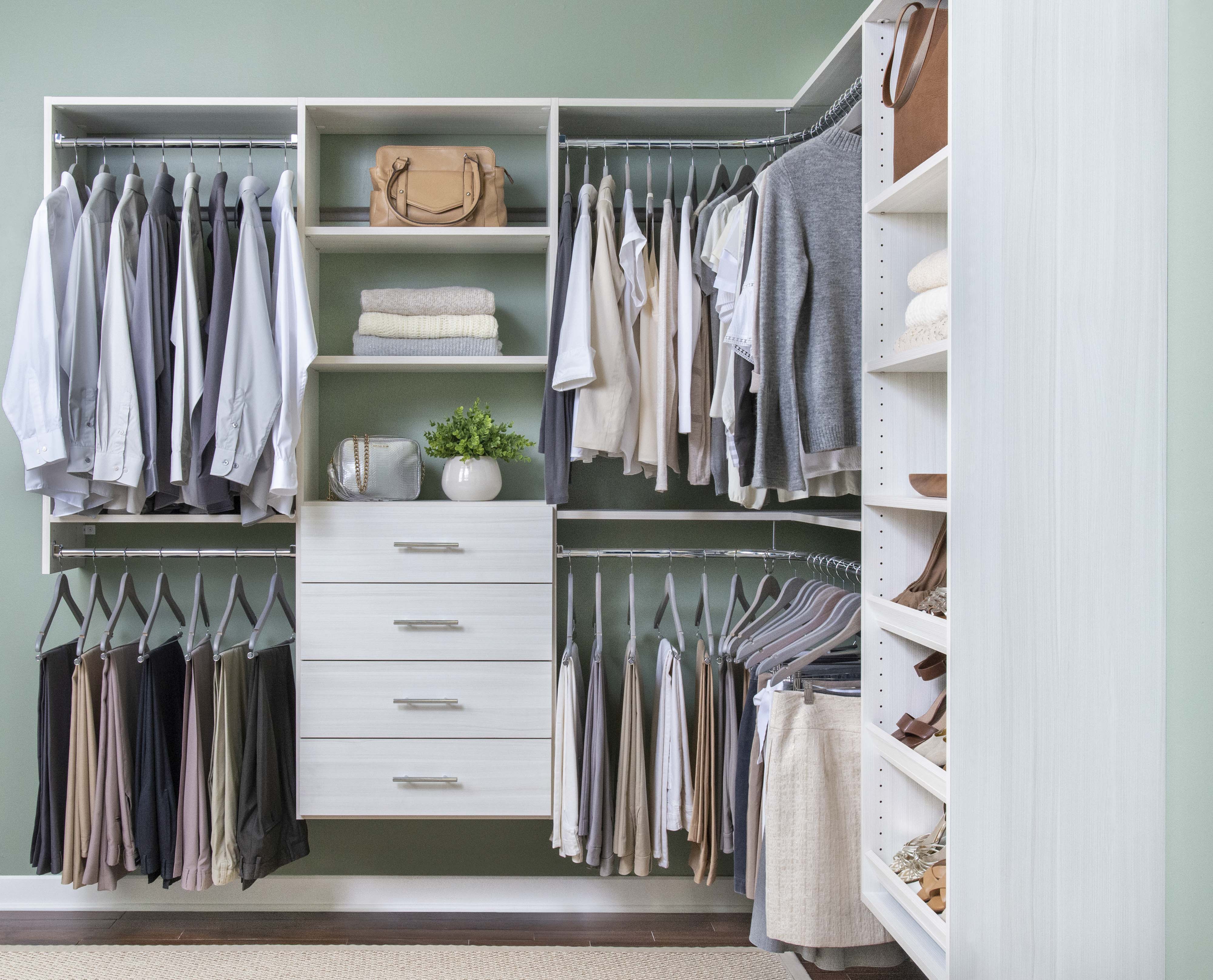 Select Built-in Closet in Snowdrift Live with men and women clothing, accessories, shoes, and green background.