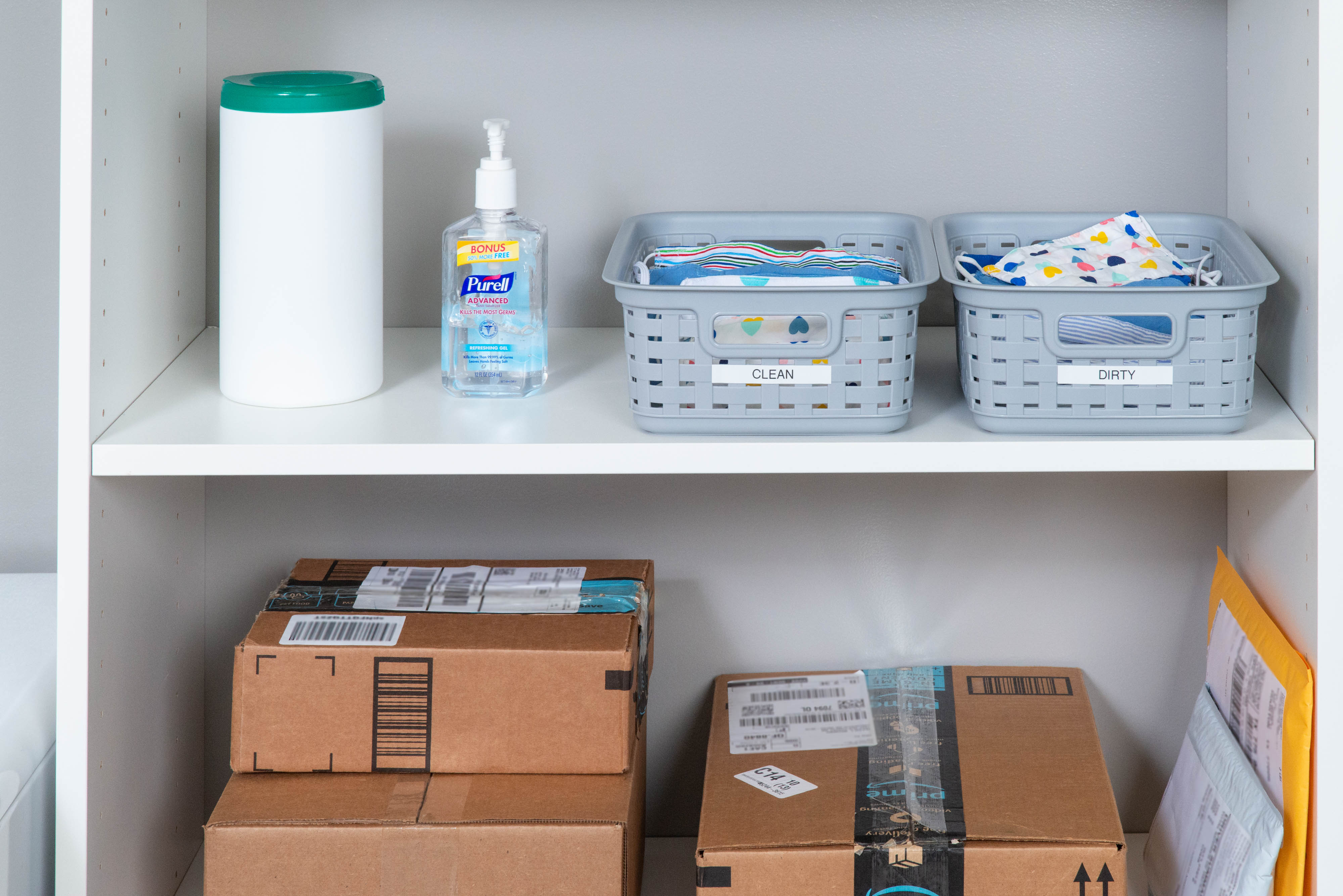 Select White Laundry Room with packages and cleaning wipes.