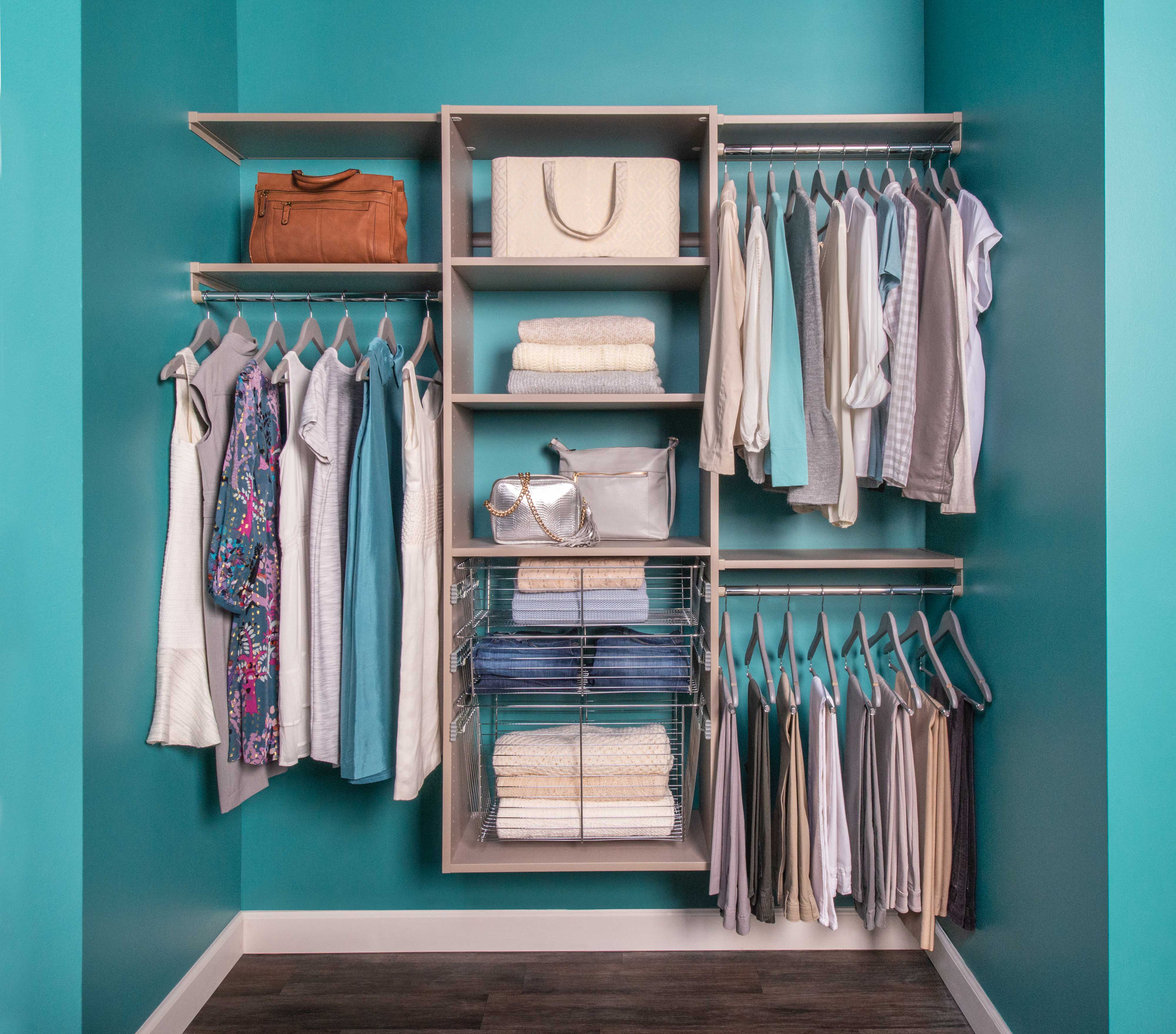 VUE Reach-in Closet in Century Gray with women's shirts, bottoms, accessories, and dresses.