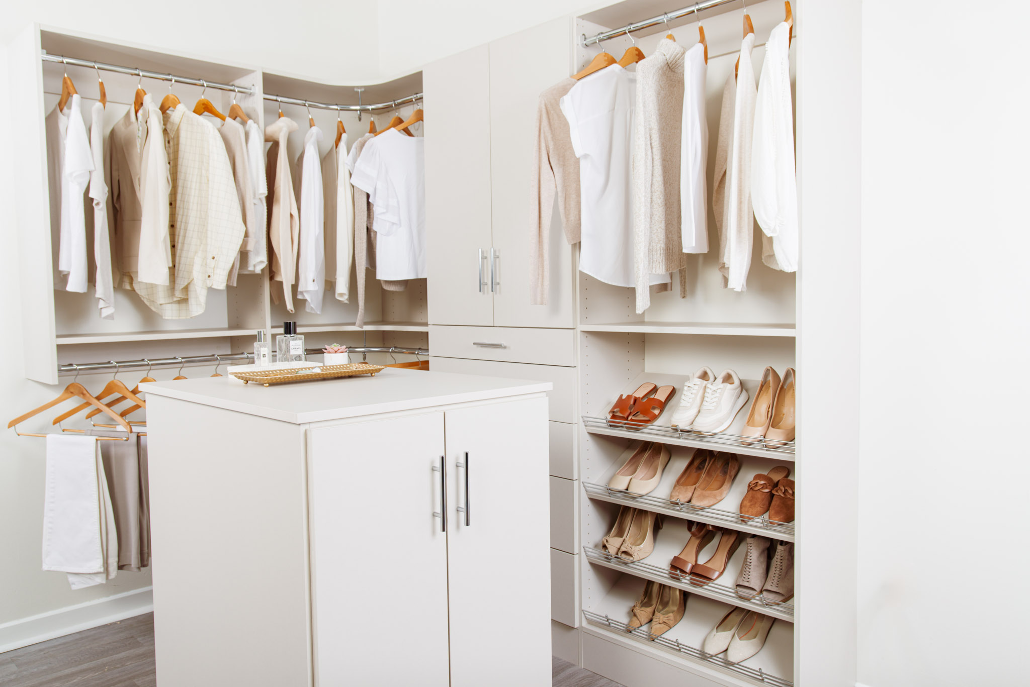 Classica_Truffle_Bedroom(Low-Res)-07 with women's neutral clothing and tan accessories.