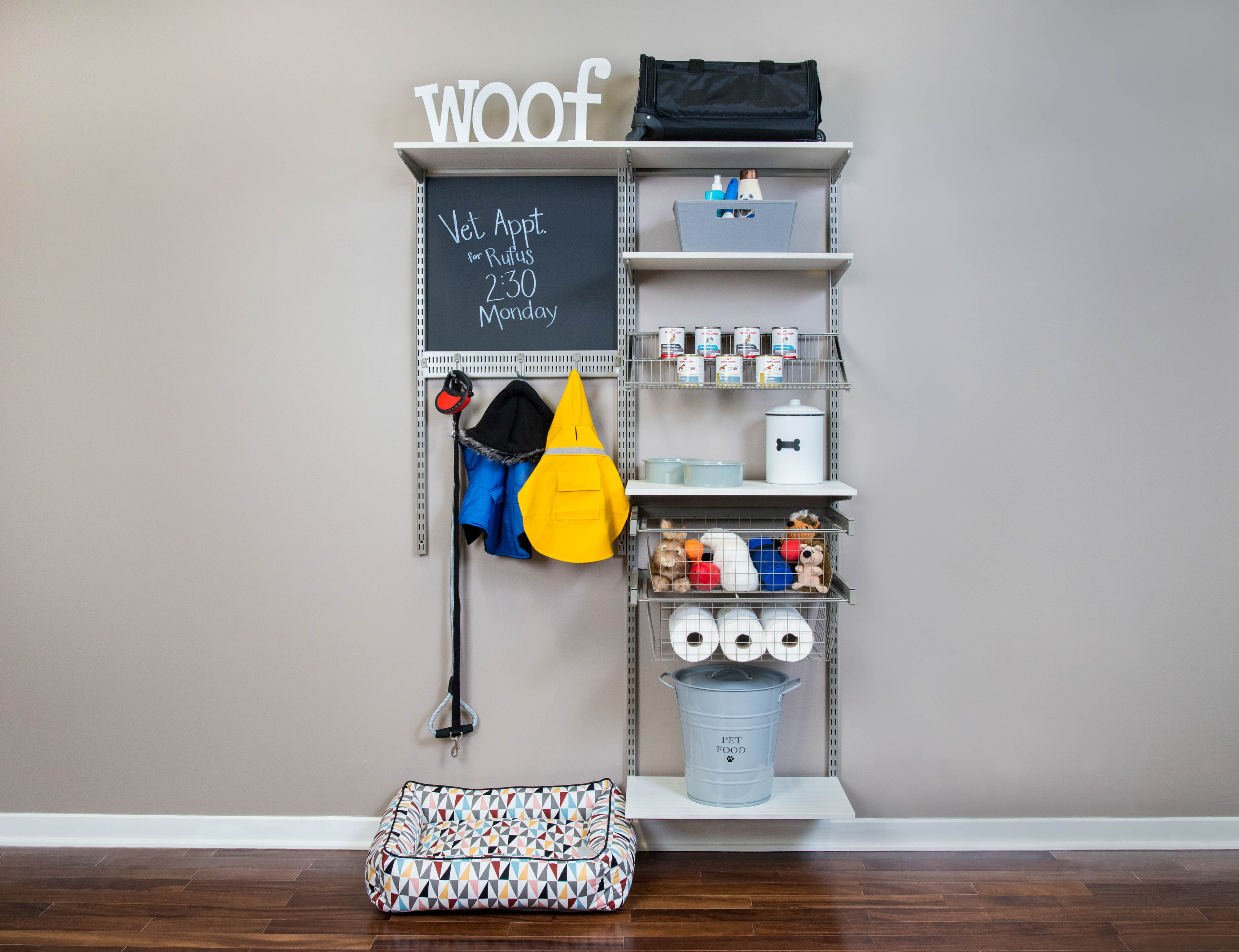 freedomRail Snowdrift Pet Mudroom with dog bed and leash.