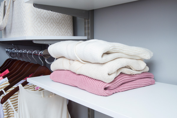 Stacked Folded Sweaters Organized-Living-White-freedomRail-closet