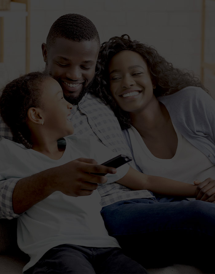 Family Sitting on Couch