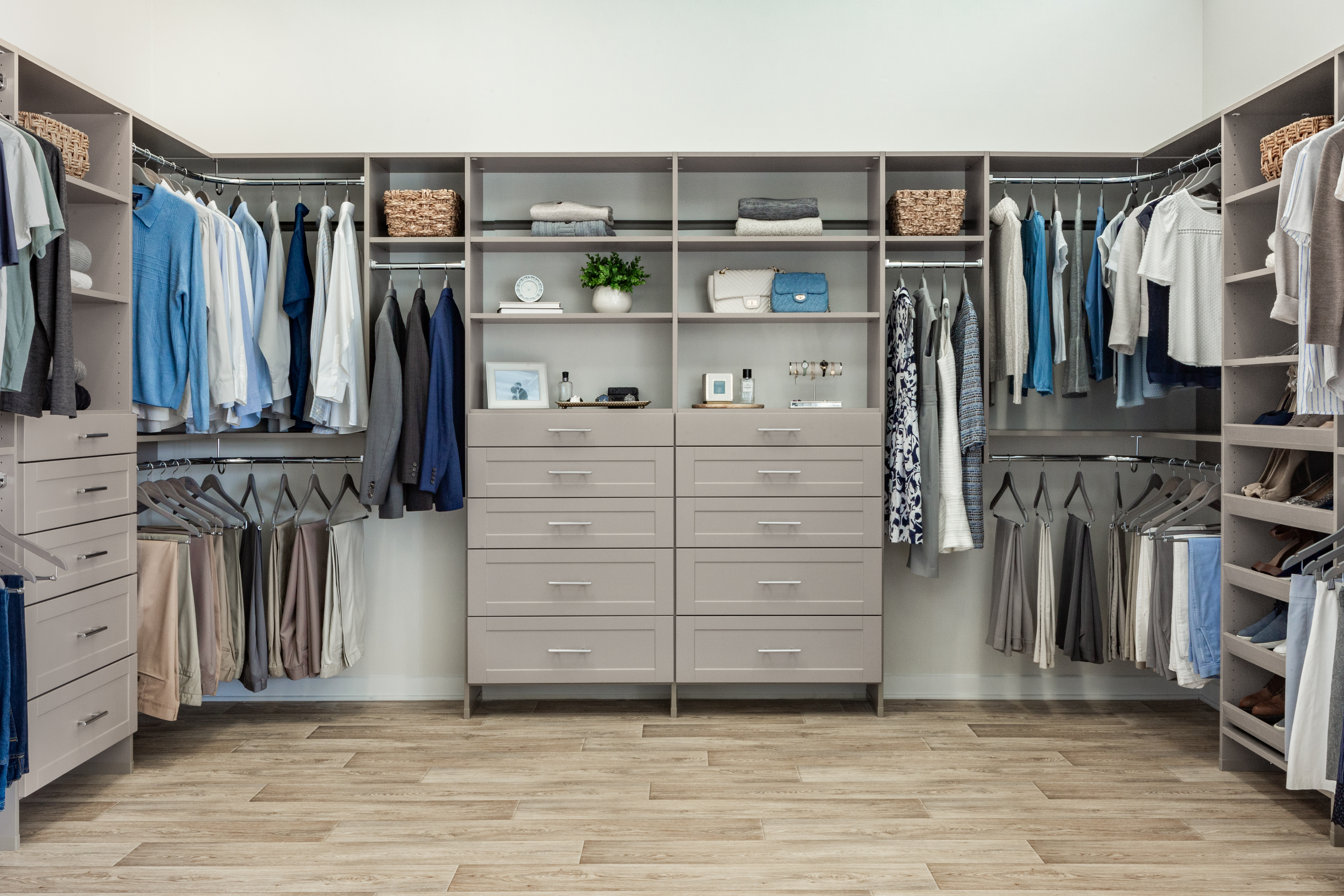 Walk-in Select Closet in Century Gray with women and men clothing with accessories, light flooring and neutral background.