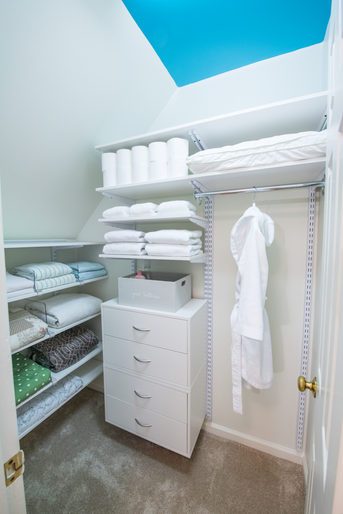 White freedomRail reach-in linen closet