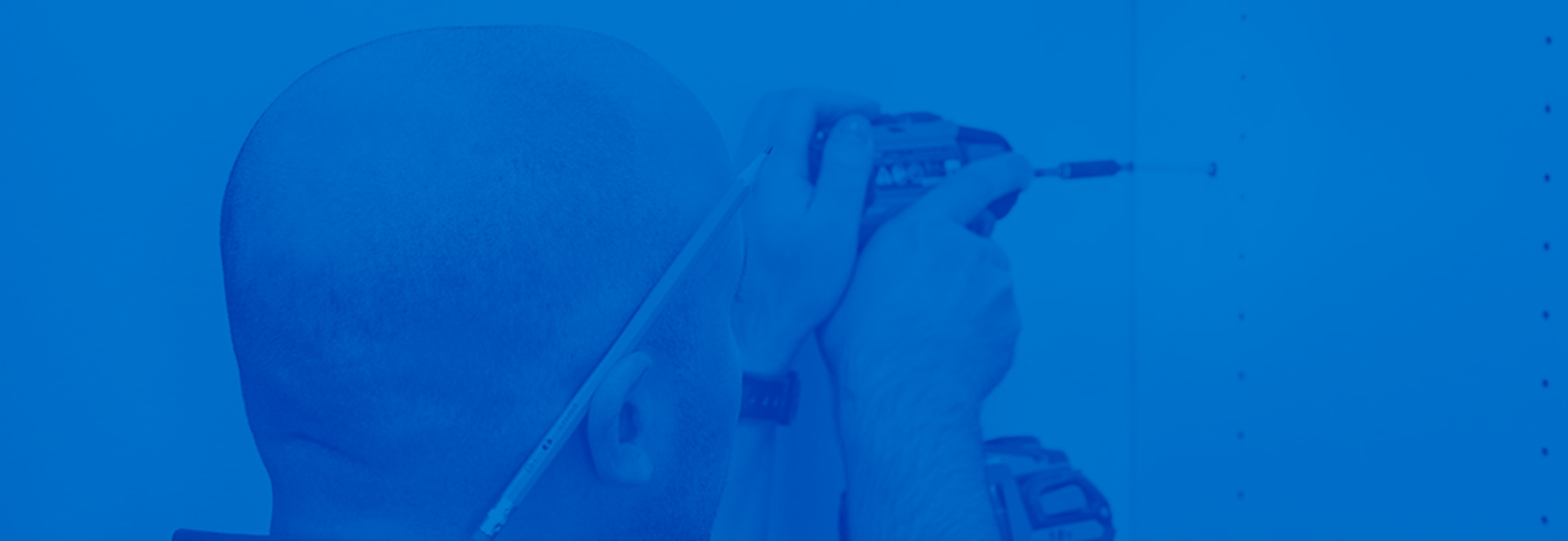 Man Installing Closet with Drill