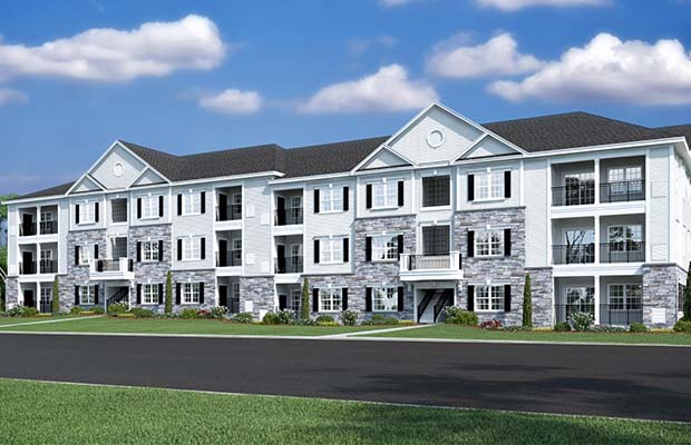 Three-story white apartment complex, Monroe Parke.