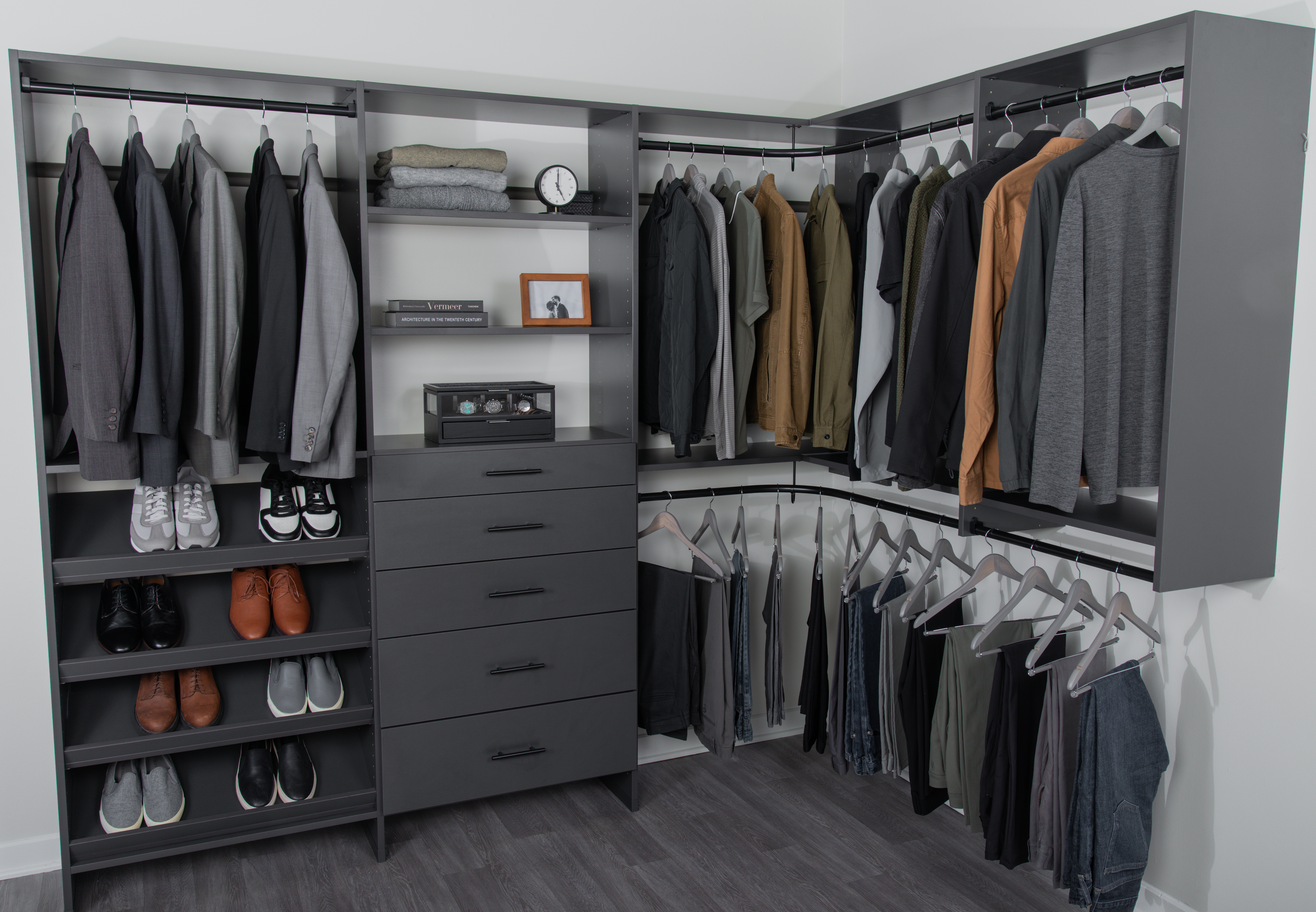 Slate bedroom built-in walk-in closet.